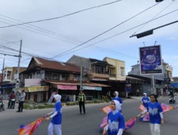 Jamin Kelancaran Kegiatan, Satlantas Polres Majene Kawal Jalan Santai Dies Natalis STIKes Bina Bangsa