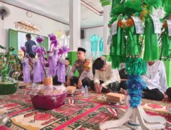 Hadiri Maulid Nabi, Bhabinkamtibmas Polsek Banggae Ajak Warga Teladani Akhlak Rasulullah
